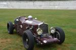 Fahrzeug Bild des Fahrers Homann mit dem Fahrzeug Wolseley Hornet Spezial